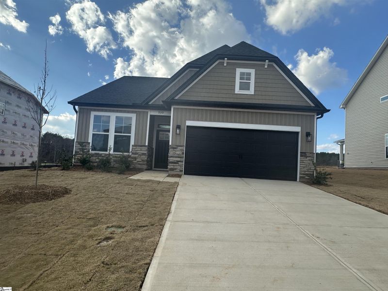 Front exterior of a new home in Shiloh Trail, Wellford, SC, highlighting curb appeal (Image 2). Front exterior of a new home in Shiloh Trail, Wellford, SC, highlighting curb appeal (Image 2).