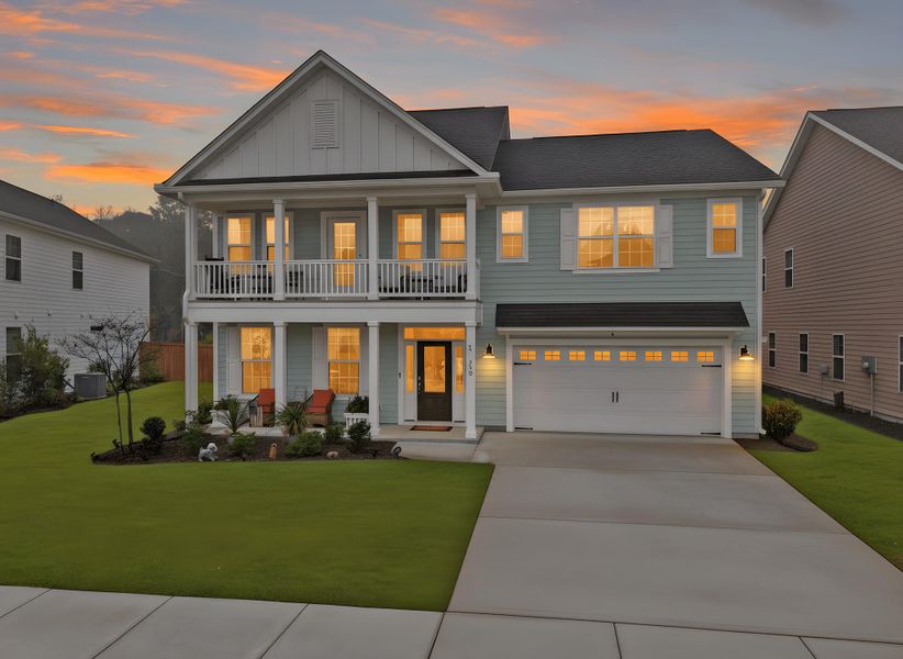 Front exterior of a new home in Hewing Farms, Summerville, SC, highlighting curb appeal (Image 2). Front exterior of a new home in Hewing Farms, Summerville, SC, highlighting curb appeal (Image 2).