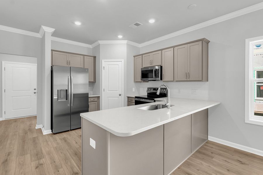 Furnished interior view inside a new home in Central Creek, Goose Creek (Image 6).