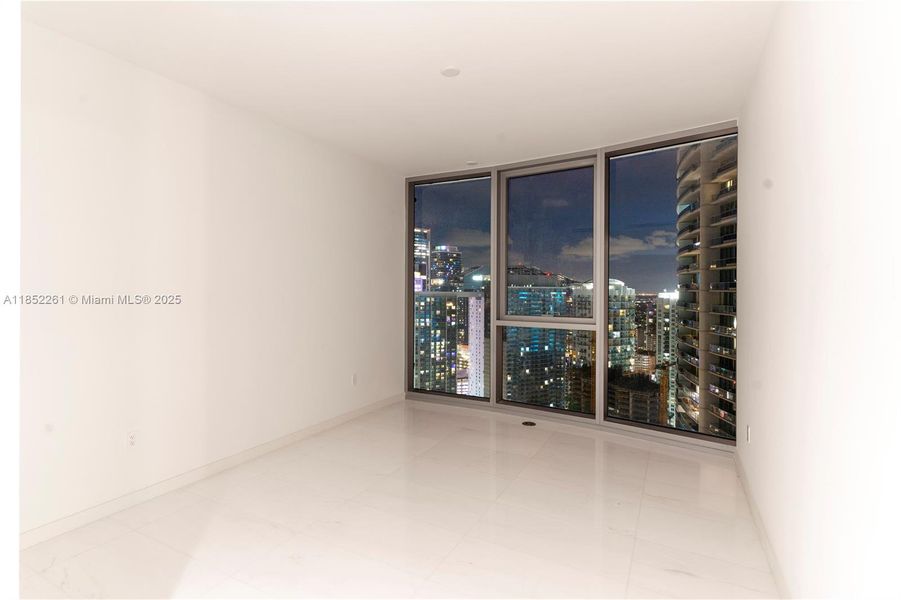 Spacious, unfurnished interior of a new home in Aston Martin Residences, Miami (Image 44).