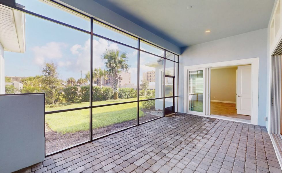 Exterior details and patio area of a home in Verona Oceanside, Ormond Beach (Image 26).
