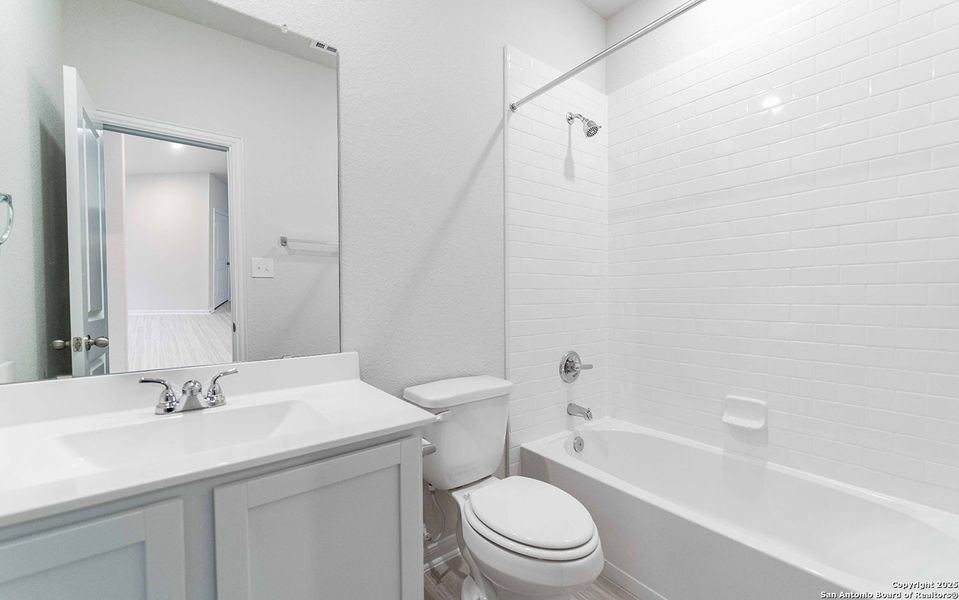 Furnished interior view inside a new home in Hickory Ridge, Elmendorf (Image 7).