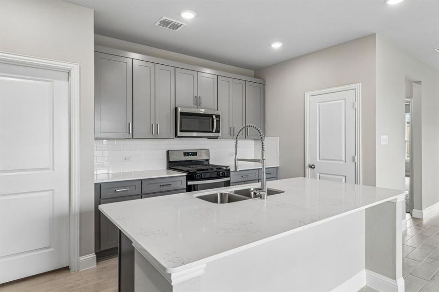 Furnished interior view inside a new home in Venetian, Weston (Image 7).