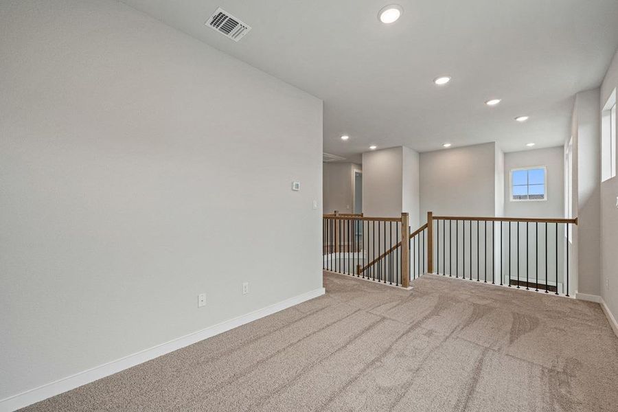 Spacious, unfurnished interior of a new home in Heritage, Dripping Springs (Image 29).