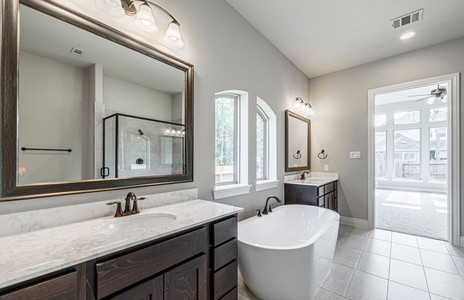 Representative furnished interior of a home built from the 4094 by Ravenna Homes in Artavia 70′, Conroe (Image 18).