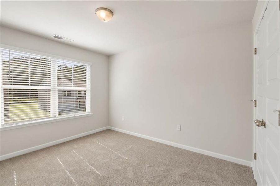 Spacious, unfurnished interior of a new home in The Brooke at Rivertown, South Fulton (Image 24).