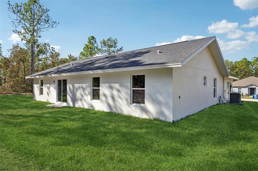 Exterior details and patio area of a home in , Brooksville (Image 3). Exterior details and patio area of a home in , Brooksville (Image 3).