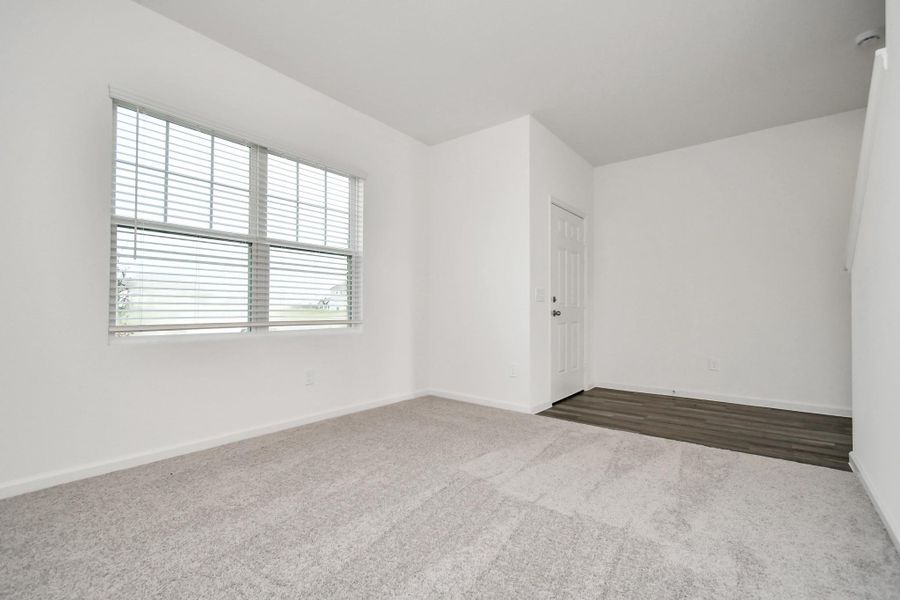 Spacious, unfurnished interior of a new home in Sunterra, Katy (Image 17).