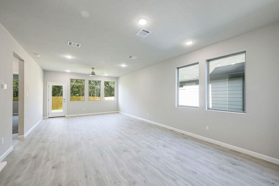 Living Room in the Willow home plan by Trophy Signature Homes – REPRESENTATIVE PHOTO