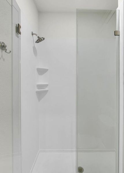 Bathroom featuring a shower stall