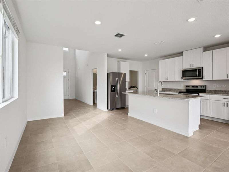 Furnished interior view inside a new home in Oakfield Trails - Premier Series, Parrish (Image 12).