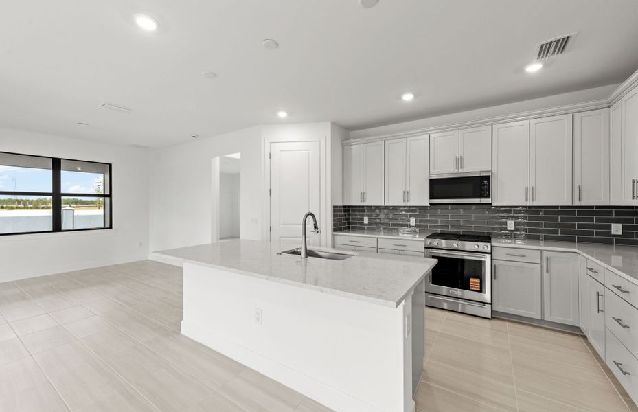 Furnished interior view inside a new home in Arbor Oaks, North Port (Image 10).