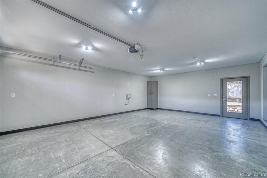 Heated, finsihed 2 car garage with extra storage