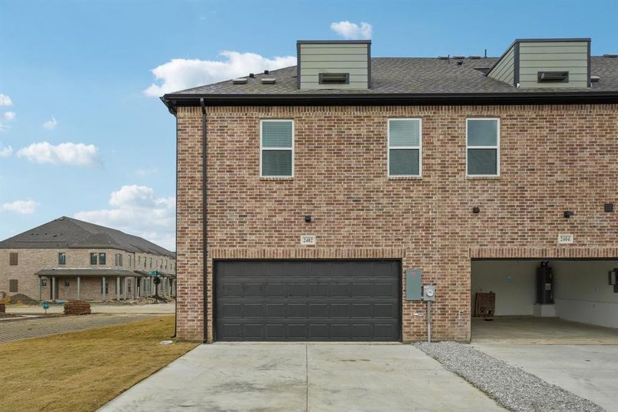 View of front of house with a garage