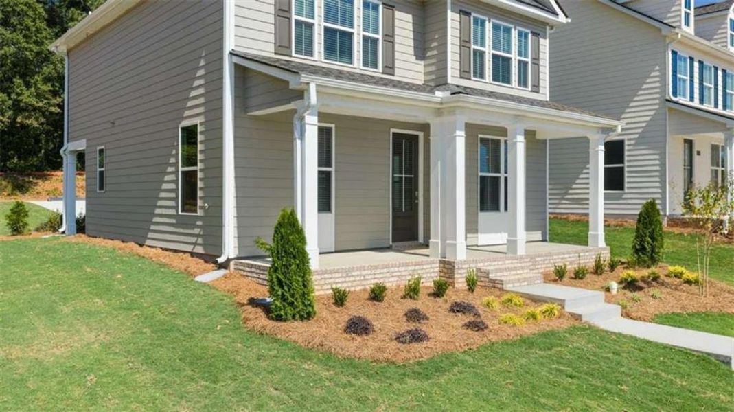 Exterior details and patio area of a home in Brookland Commons, Monroe (Image 3).