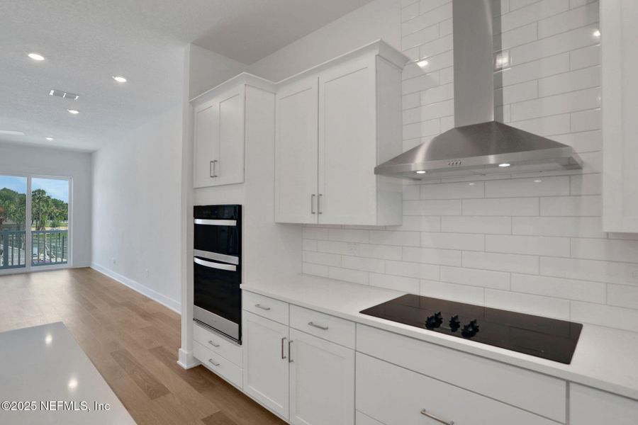 Furnished interior view inside a new home in North Beach Townhomes, Jacksonville Beach (Image 8).