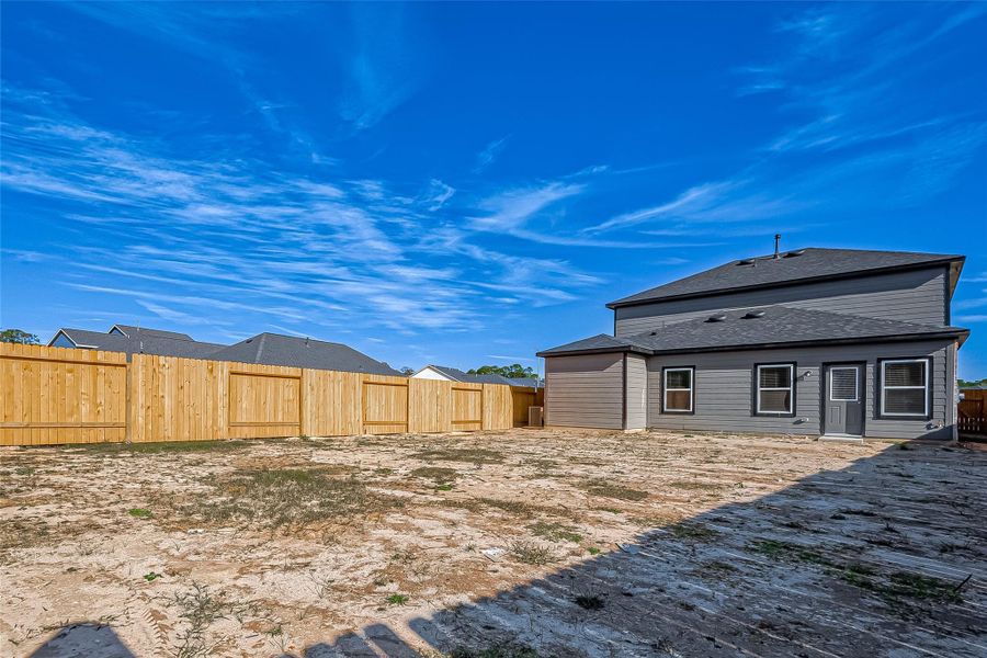 Exterior details and patio area of a home in Mill Creek Trails, Magnolia (Image 3).
