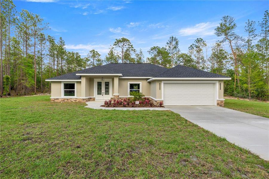 Front exterior of a new home in , Ocala, FL, highlighting curb appeal (Image 16).