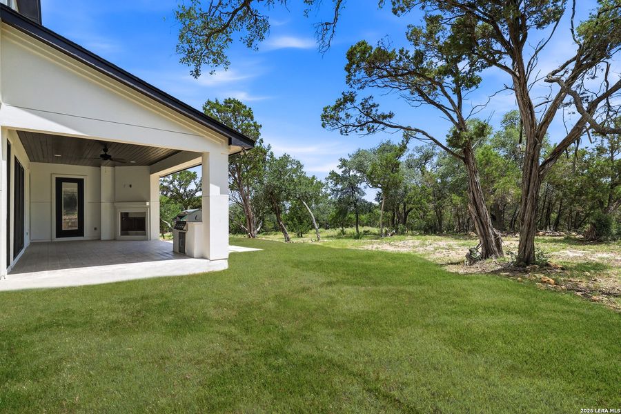 Exterior details and patio area of a home in , New Braunfels (Image 4).