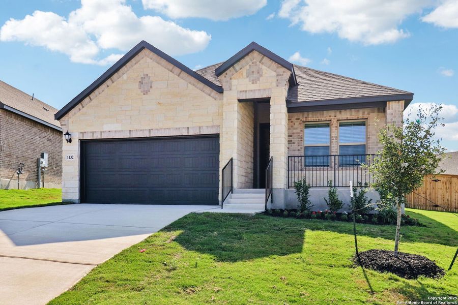 Front exterior of a new home in Arcadia Ridge - Premier Series, San Antonio, TX, highlighting curb appeal (Image 25). Front exterior of a new home in Arcadia Ridge - Premier Series, San Antonio, TX, highlighting curb appeal (Image 25).