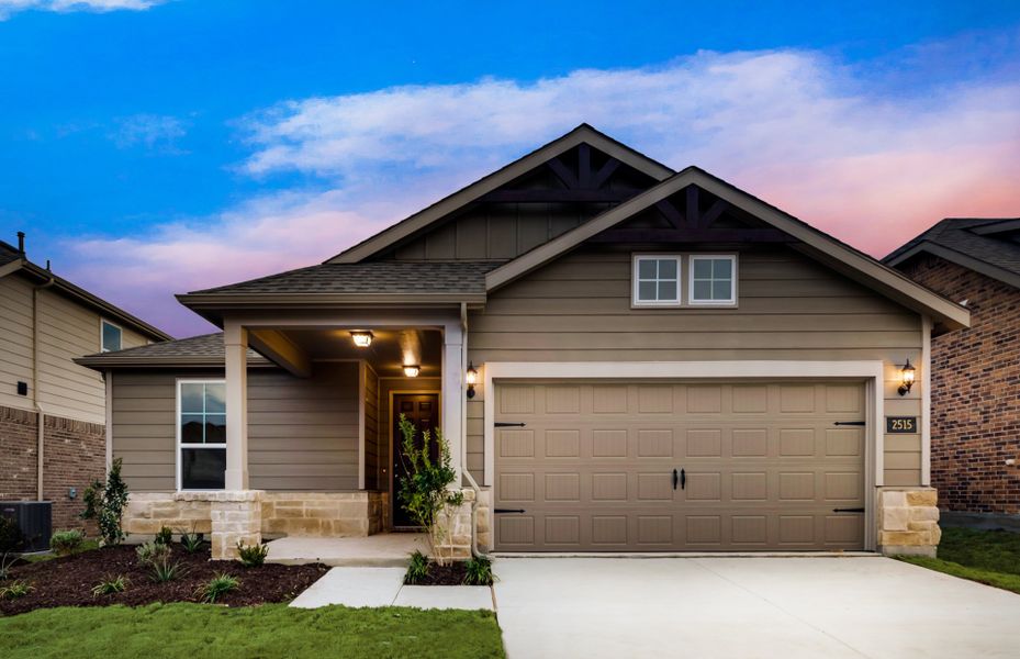 The Emory, a one-story home with 2-car garage, shown with Home Exterior 40