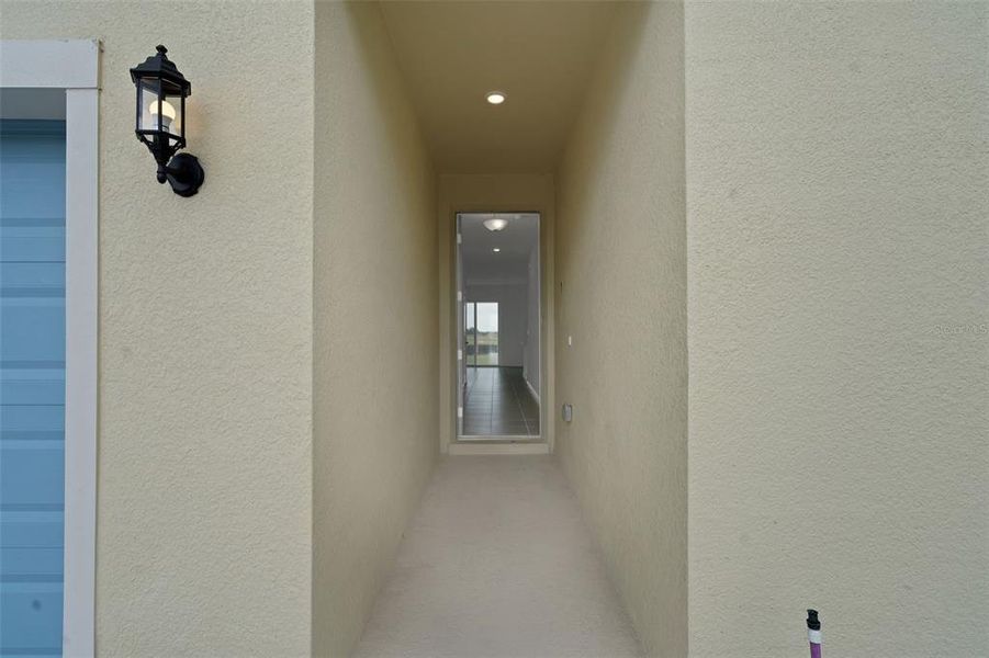 Exterior details and patio area of a home in Annabelle Estates, Lake Wales (Image 3).