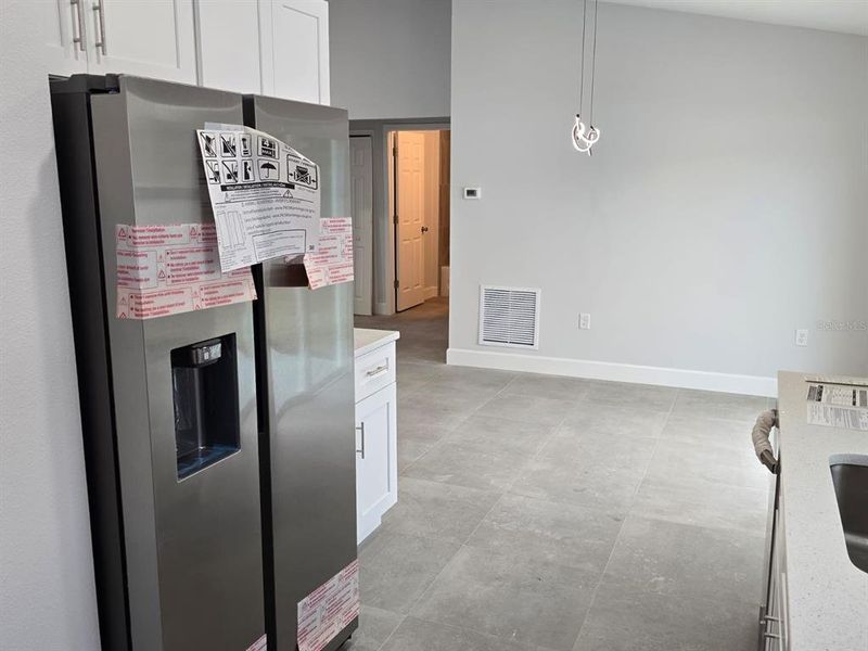 Furnished interior view inside a new home in , Dunnellon (Image 7).