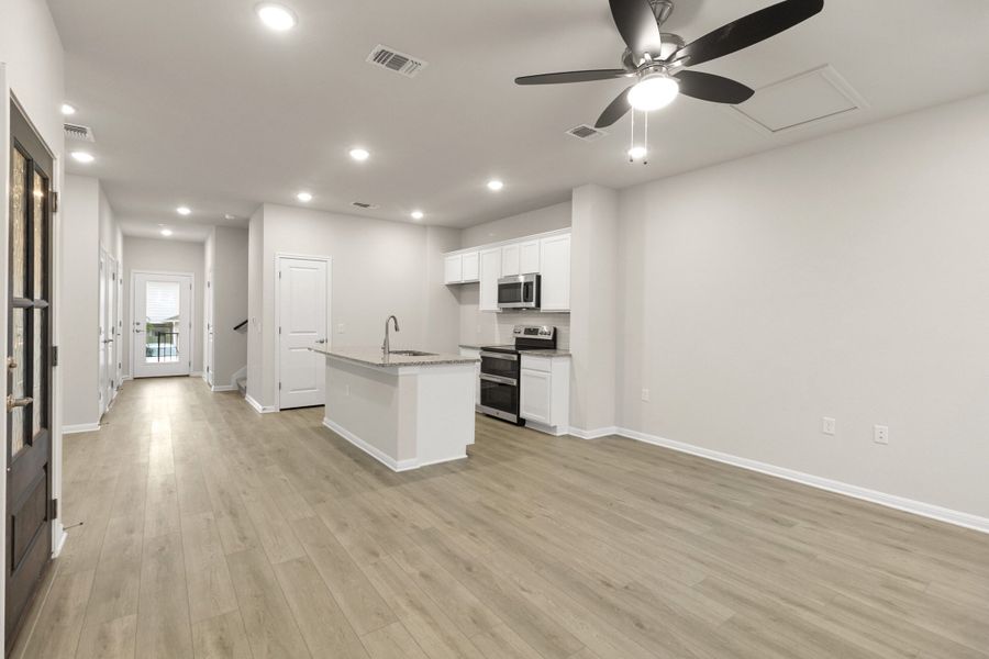 Spacious, unfurnished interior of a new home in Whisper Valley, Manor (Image 28). Spacious, unfurnished interior of a new home in Whisper Valley, Manor (Image 28).