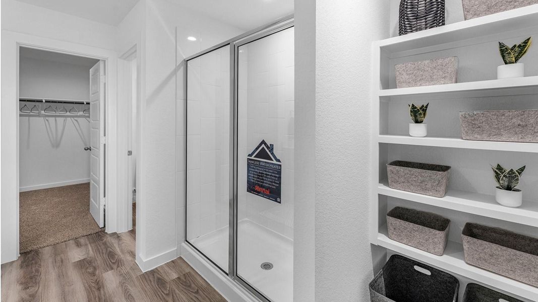 Representative photo. The second floor is designed for comfort and flexibility, highlighted by a spacious primary suite with a well-appointed bath that includes a separate shower and tub. Two additional bedrooms easily accommodate guests, while a central flex space creates endless possibilities for a game room, second living area, or personalized retreat. Representative photo. The second floor is designed for comfort and flexibility, highlighted by a spacious primary suite with a well-appointed bath that includes a separate shower and tub. Two additional bedrooms easily accommodate guests, while a central flex space creates endless possibilities for a game room, second living area, or personalized retreat.