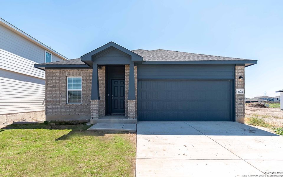 Front exterior of a new home in Red Hawk Landing, San Antonio, TX, highlighting curb appeal (Image 1).