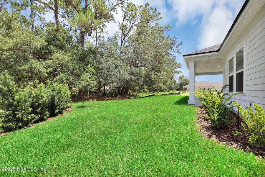 Exterior details and patio area of a home in Creighton Pointe, Fleming Island (Image 4).