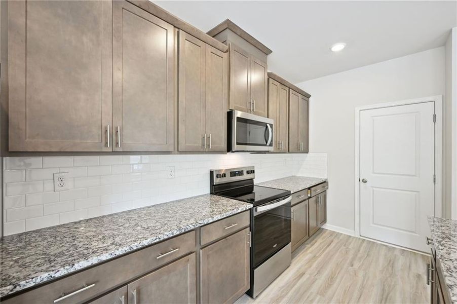 Furnished interior view inside a new home in Hawthorne Station, College Park (Image 16).