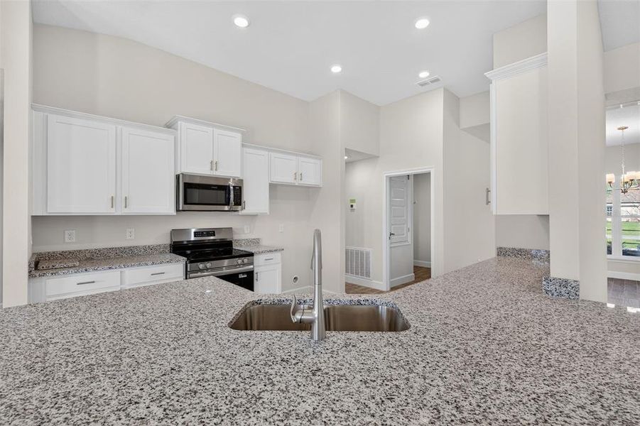 Furnished interior view inside a new home in Hill Country Estates, Dade City (Image 13).