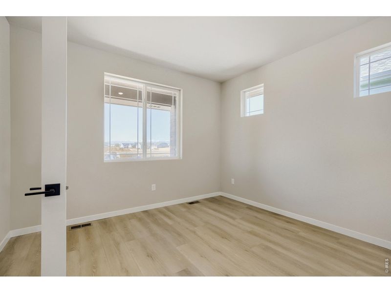 Spacious, unfurnished interior of a new home in Farmstead, Berthoud (Image 21).