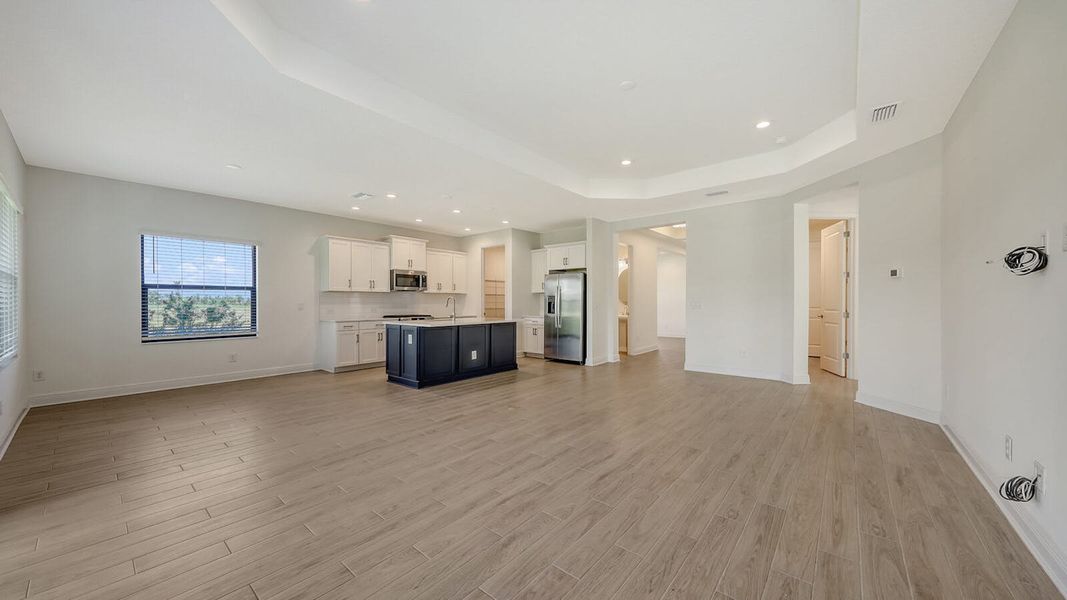 Spacious, unfurnished interior of a new home in Palm Grove Real Estate and Homes for Sale in Lakewood Ranch, FL - Neal Communities, Lakewood Ranch (Image 24).