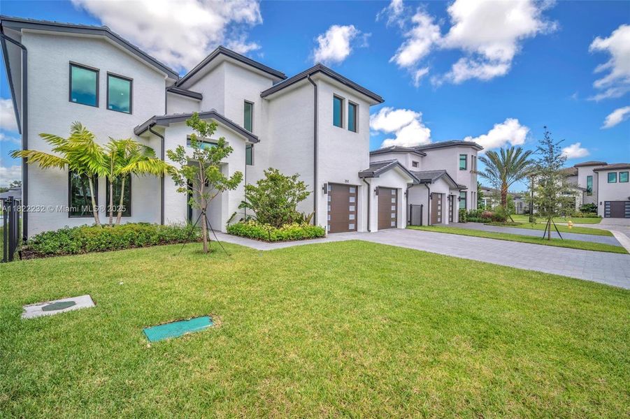 Front exterior of a new home in , Hollywood, FL, highlighting curb appeal (Image 25).