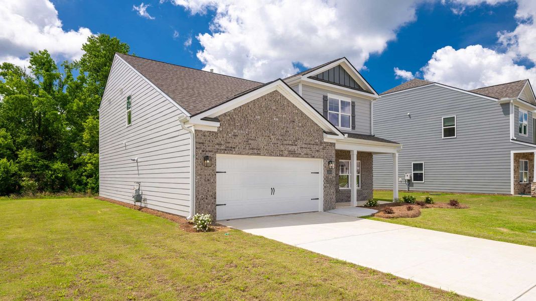 Front exterior of a new home in Prairie Pass, Apison, TN, highlighting curb appeal (Image 19).