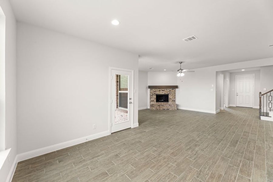 Representative exterior photo of a completed home built from the Newport by Impression Homes in Mercer Meadows, Royse City, TX (Image 11). Representative exterior photo of a completed home built from the Newport by Impression Homes in Mercer Meadows, Royse City, TX (Image 11).