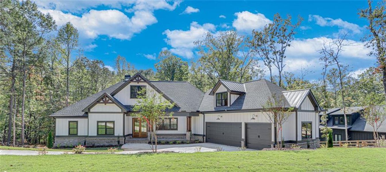 Front exterior of a new home in , Cumming, GA, highlighting curb appeal (Image 1).
