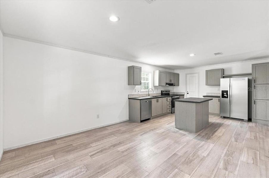 Furnished interior view inside a new home in , Zephyrhills (Image 9).