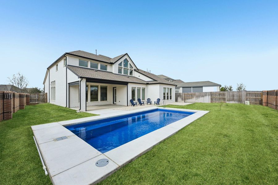 Exterior details and patio area of a home in Elyson, Katy (Image 29).