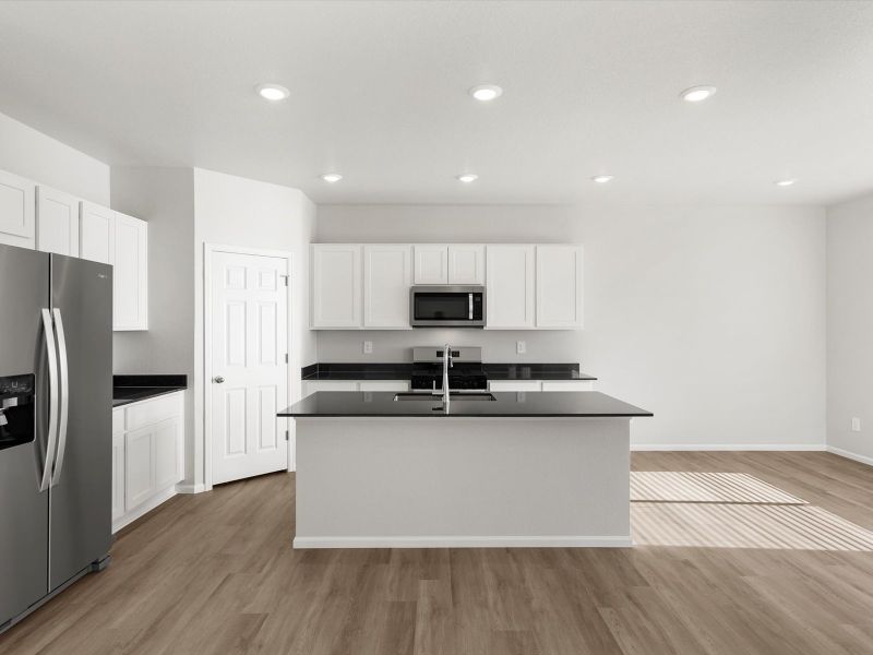 Furnished interior view inside a new home in Lorson Ranch: The Trail Collection, Colorado Springs (Image 4).