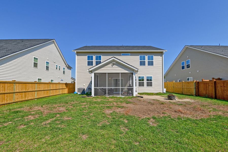 Exterior details and patio area of a home in Heron's Walk at Summers Corner, Summerville (Image 31).