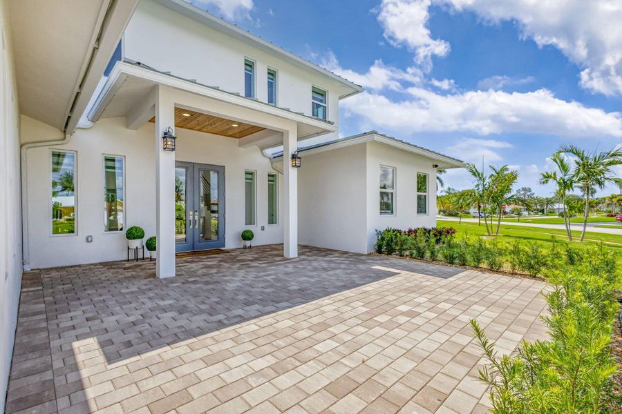 Front exterior of a new home in , North Palm Beach, FL, highlighting curb appeal (Image 30). Front exterior of a new home in , North Palm Beach, FL, highlighting curb appeal (Image 30).