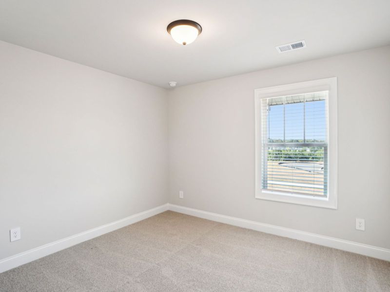 Spacious, unfurnished interior of a new home in Hemingway - Highland Series, Cumming (Image 20).