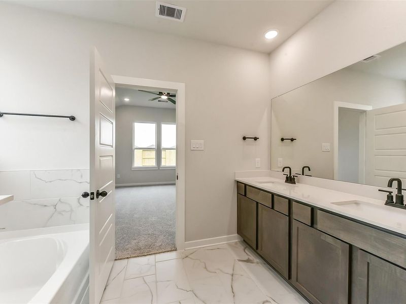 Furnished interior view inside a new home in Sundance Cove, Crosby (Image 32).