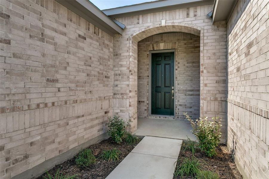 Exterior details and patio area of a home in The Preserve Estates, Justin (Image 3).