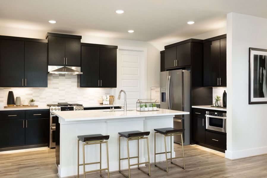 Representative furnished interior of a home built from the Quinley by Scott Felder Homes in Prominence, San Antonio (Image 7).