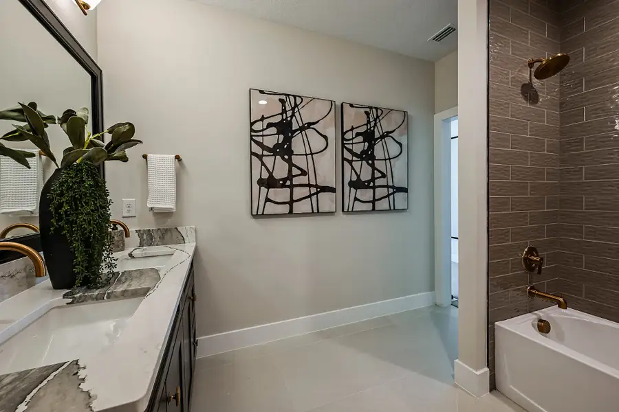 Furnished interior in a model home at Oakfield in Parrish (Image 19).