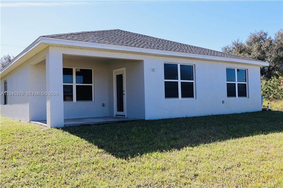 Exterior details and patio area of a home in , Lehigh Acres (Image 12). Exterior details and patio area of a home in , Lehigh Acres (Image 12).